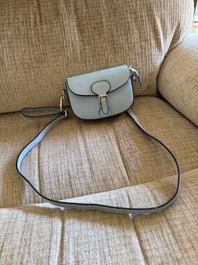 Italian light colored blue Crossbody bag measure 6 1/2 x 5 made it in Italy